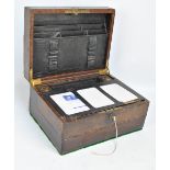 An Edwardian leather and stained beech combination writing slope and jewellery box, the interior