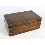 A late 19th/early 20th century mahogany and brass bound campaign style writing slope (for