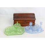 A walnut domed box with hinged lid, a large brass letter clip and two glass dressing table sets,