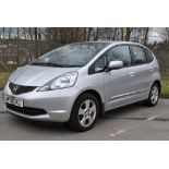 A 2010 Honda Jazz ES I-VTEC 1.4, 5 door in silver, mileage 26033, reg MF10 GKC.