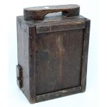 An early 20th century pine shoe shine box with polish compartment and change drawer,