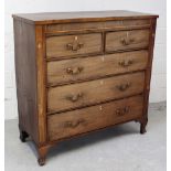 A George III mahogany two-over-three chest of drawers on ogee bracket feet,