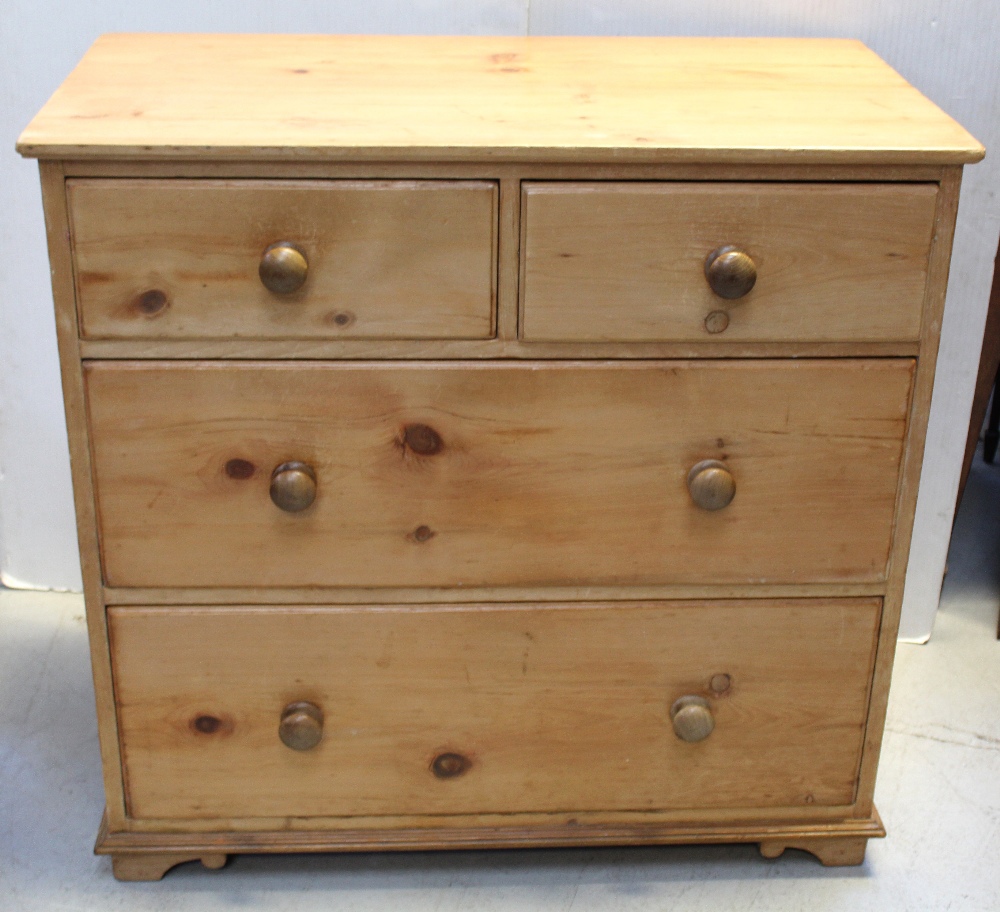 A 19th century pine chest of two short over two long drawers, on bracket feet, approx 95 x 99cm.