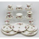 A quantity of Royal Albert 'Moss Rose' pattern teaware.