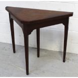An oak triangular card table with inset green baize top, height 73cm,