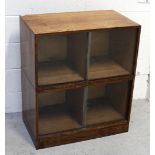 Two oak stacking bookshelves on plinth base with sliding glass doors, overall size 81 x 69cm.