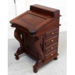 A modern reproduction tropical hardwood Davenport desk,