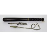A George V wooden truncheon with metal collar above turned handle, two contemporary whistles,