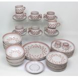 A quantity of Denby 'Clover Leaf' design tea and dinnerware, comprising two dinner plates,