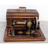 A cased Jones sewing machine.