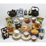 A quantity of ceramics to include a Staffordshire dog, teacups and saucers,