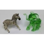A Beswick zebra figurine, height 18.5cm and a Murano type green glass elephant (2).