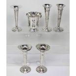 Two pairs of silver-plated trumpet vases on spreading circular bases,