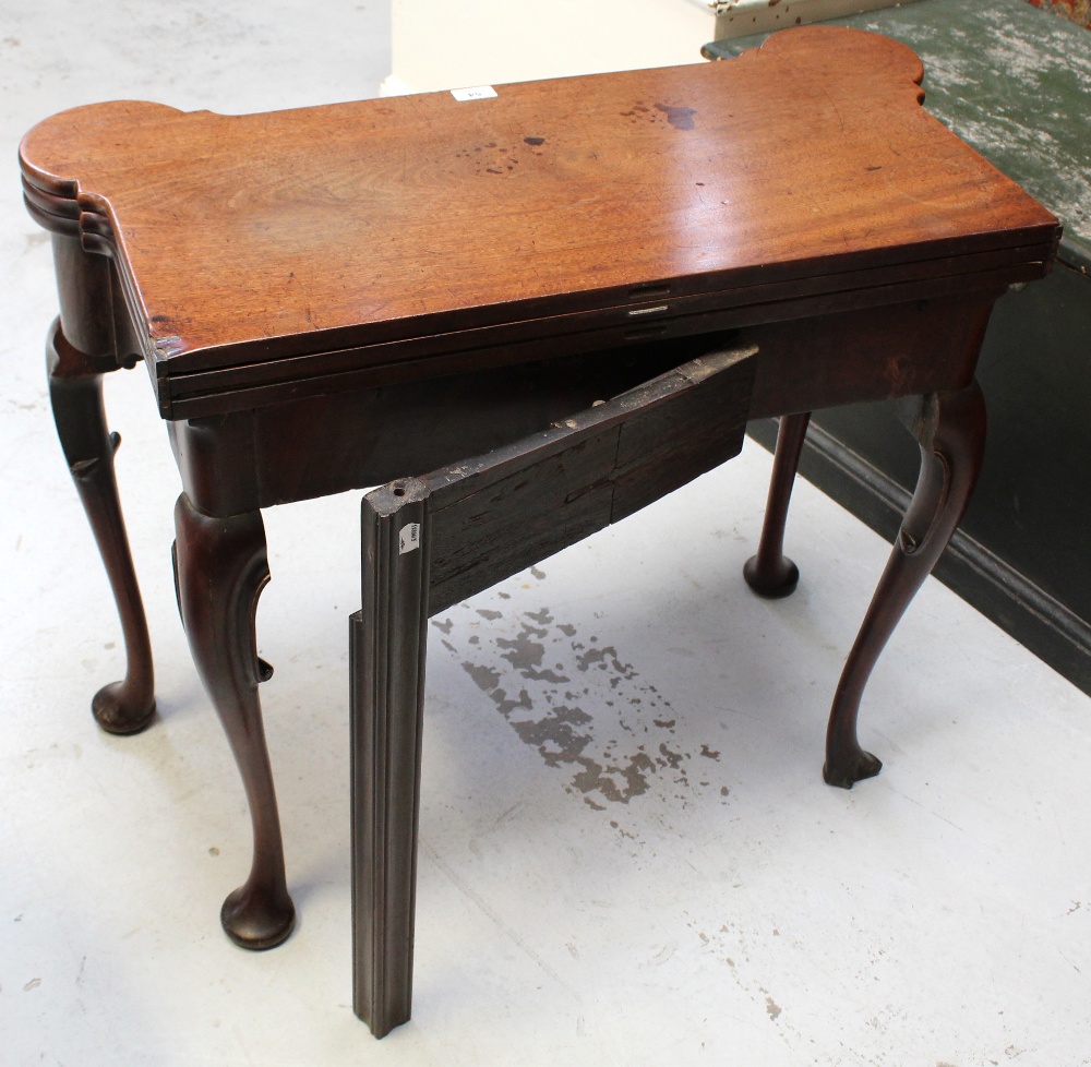 A mid-18th century mahogany two-leaf folding card and tea table with lobed corners, - Image 4 of 9