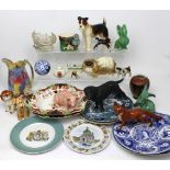 A collection of pottery animals to include a Coopercraft Labrador and one other Coopercraft dog,