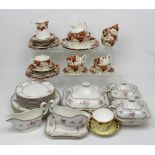 A set of Wedgwood floral-decorated tableware including five graduated oval platters,