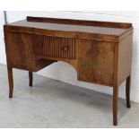 A 20th century sideboard with central drawer flanked by twin cupboard doors, approx 95 x 134cm.