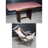 An Art Deco style rectangular dining table, pink painted top to unpainted slab supports,