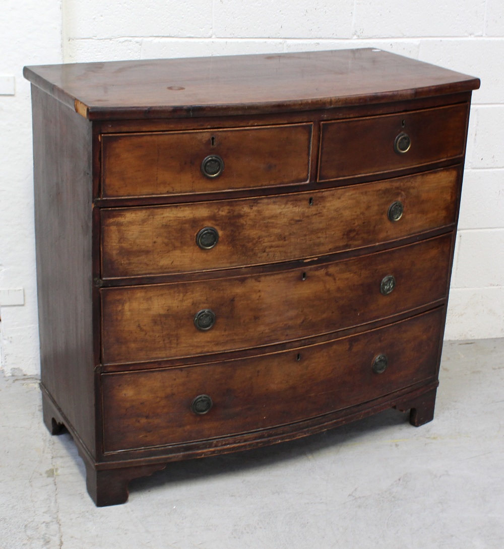 A 19th century mahogany bow-front chest of two-over-three drawers, on square bracket feet,