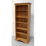 A modern pine five-shelf bookcase, approx 188 x 75cm.