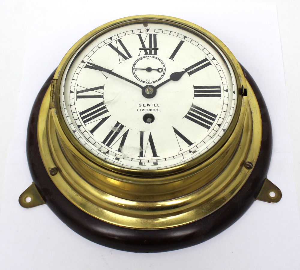 A Sewill of Liverpool brass ship's bulkhead clock,