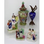 A mixed lot of ceramics including three Staffordshire figures, enamelled blue glass ewer etc.