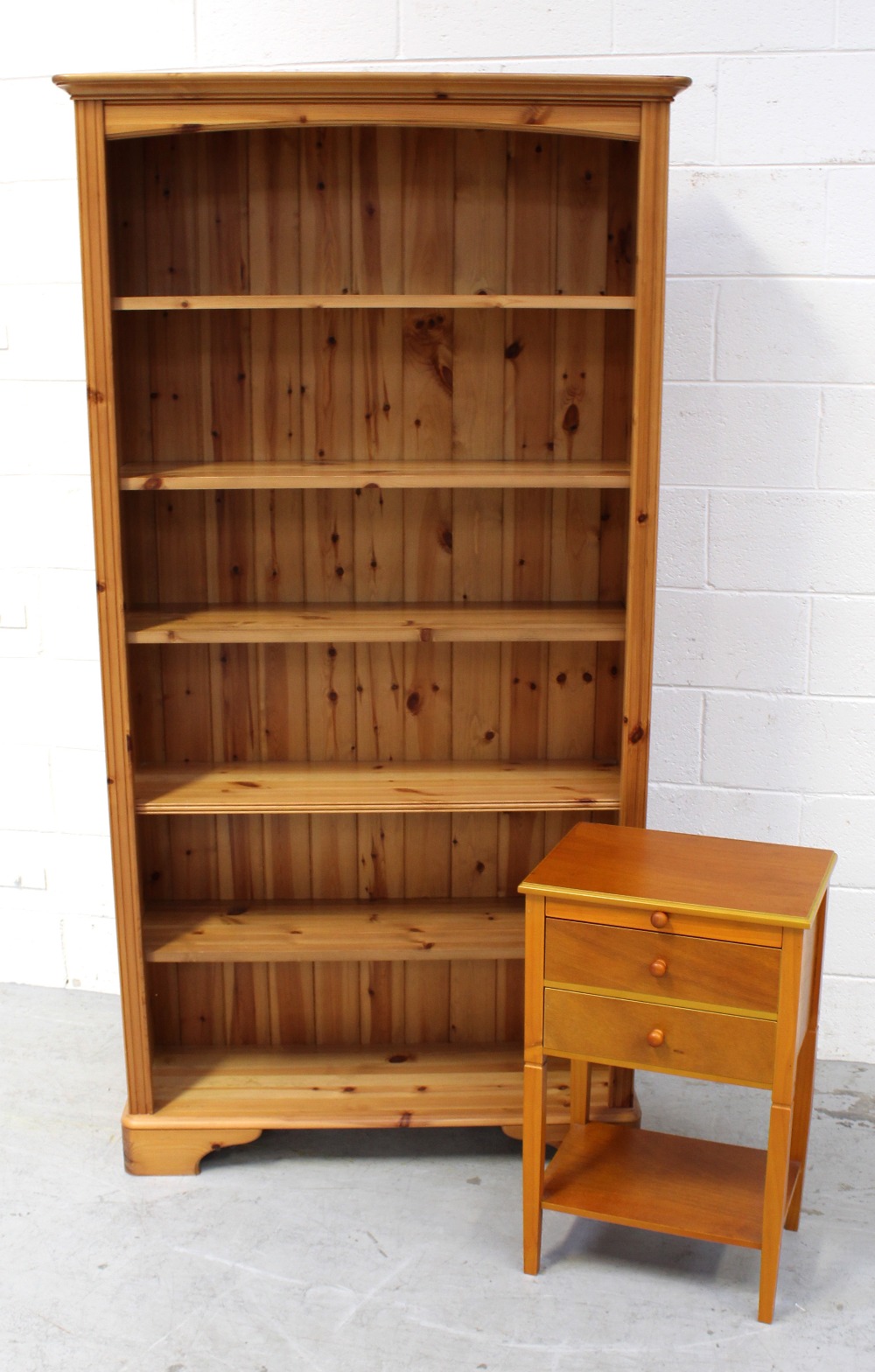 A modern pine five-shelf bookcase, 188 x 98cm and a side table (2).