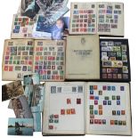 Five stamp albums containing mainly world stamps,