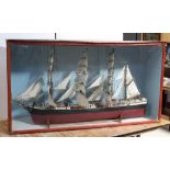 A scratch-built and hand-painted model ship with three mainsails and miniaturised detail throughout,