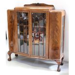 A mid-to-late 20th century mahogany bow-front display cabinet,