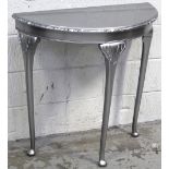 An Edwardian demi-lune hall table on slender tapering support to pad feet, sprayed silver.