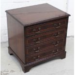 A small mahogany reproduction cabinet as a chest of four drawers,