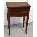 A modern mahogany two-drawer side table on splayed tapering legs, 78 x 54 x 35cm.