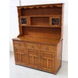 An oak country-style dresser with Delft plate rack,