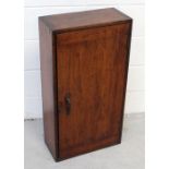 A late 19th/early 20th century Arts and Crafts style oak wall-hanging cabinet,