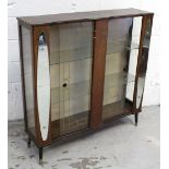 A c1950s display cabinet with two interior glass shelves and side panels, height 110cm.