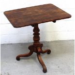 A 19th century tilt-top rectangular table on quadripartite supports, 55 x 72cm.