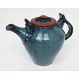 Dave Backhouse; a large earthenware blue glazed teapot, height approx 16.5cm.