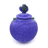 Simon Shaw; a blue matte glazed ginger jar with lid, green glazed small handles to either side,