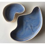 Wendy Johnson; a pair of abstract shaped bowls with blue glaze interior,