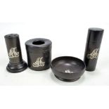 Four matching ebony items including a pounce pot, height 8.