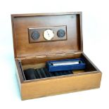 A Lubinsky walnut humidor with figured top, 35 x 21cm,