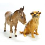 BESWICK; a terrier, signed John Beswick to base, height 10cm, also a donkey, height 11.5cm (2).