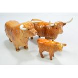 BESWICK; a family of Longhorn Highland cattle, comprising cow, bull and calf,