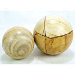 Two Travertine marble spheres, diameter approx 20cm (2).