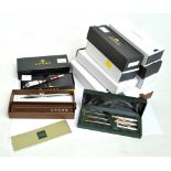 CROSS; two boxed fountain pens, a triple boxed pen set,