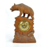 An early 20th century Bavarian Black Forest carved beech barometer,