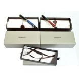 PELIKAN; two boxed ballpoint pens, one with black/blue body,