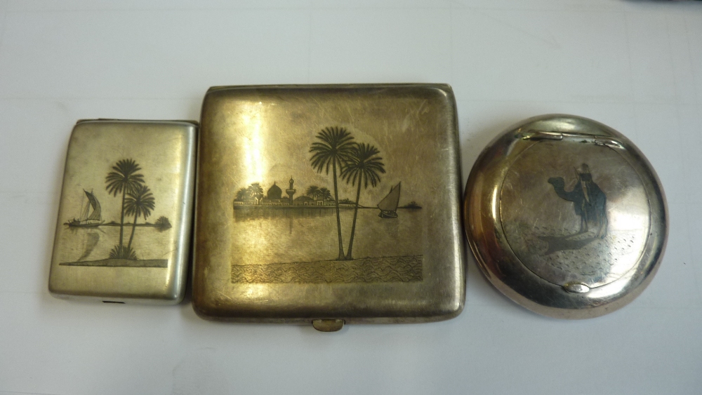 A group of various early 20th century Iraqi niello decorated white metal items comprising cigarette - Image 2 of 4