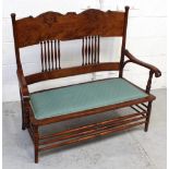 An Edwardian oak Arts and Crafts sofa,